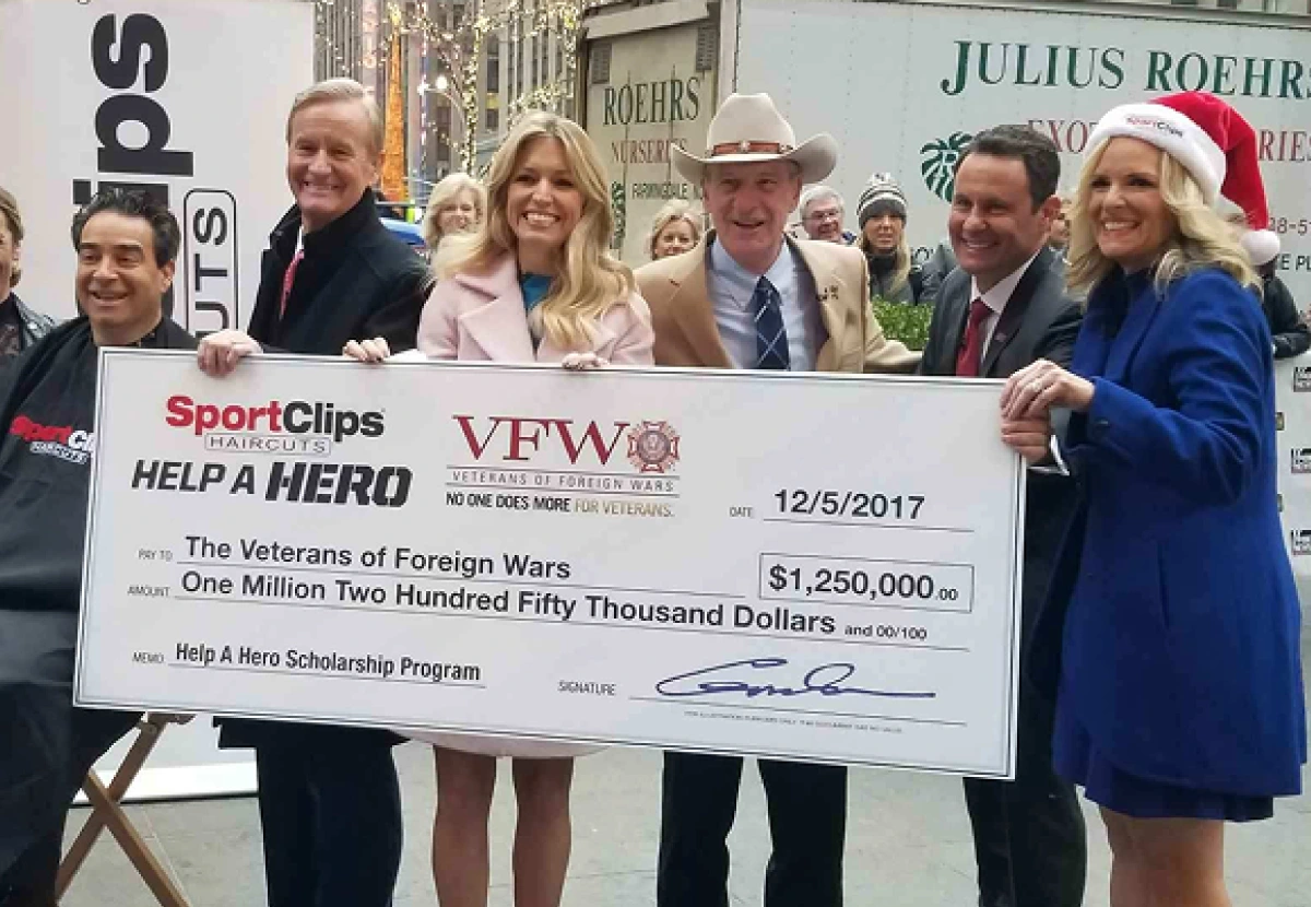 Help a Hero check presentation for $1,250,000 to the Veterans of Foreign War company