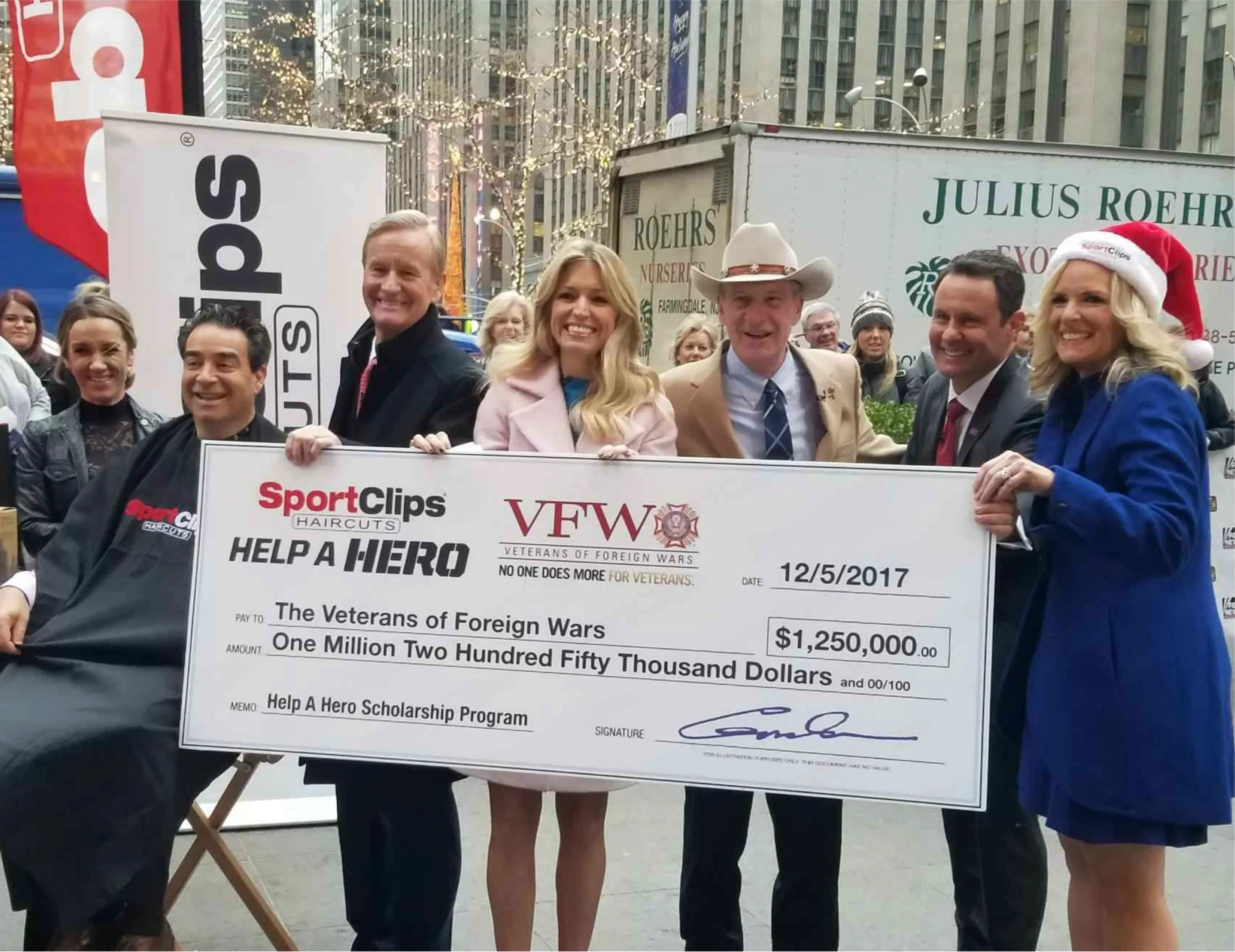 Sport Clips and VFW Help a Hero campaign present a one million dollar check to the Veterans of Foreign Wars group